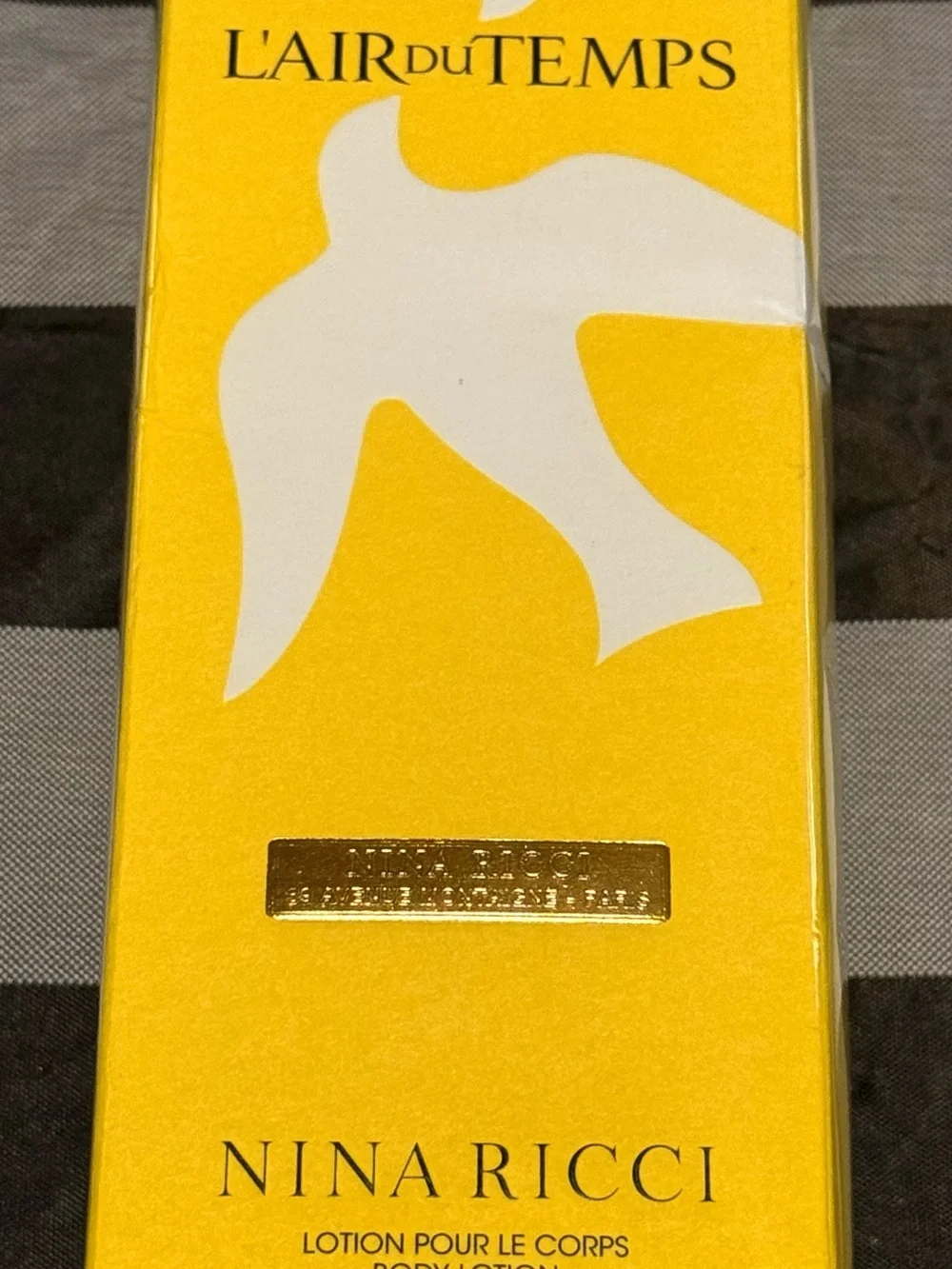 Nina Ricci Yellow Packaging Body Lotion Box